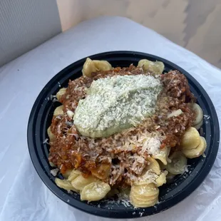 Orecchiette alla bolognese with a scratch made basil ricotta