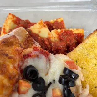 a slice of pizza and a piece of bread