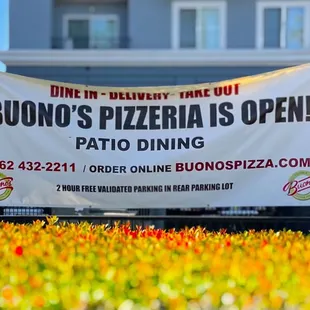 a banner in front of a building