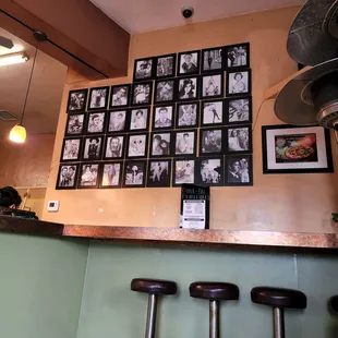 a bunch of pictures on the wall