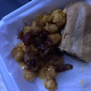 a sandwich and potatoes