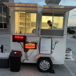 a food truck parked in a parking lot
