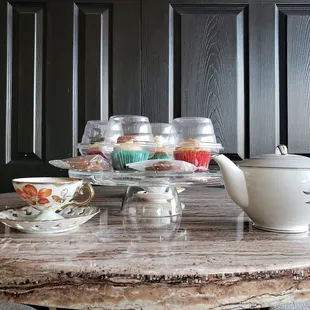 Sit and enjoy a pot full of tea and some sweets.