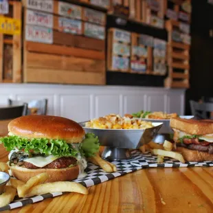 a burger and french fries on a table