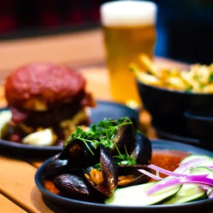 Joe&apos;s Mussels, Southern Slaw Burger, and House Fries at The Arbor