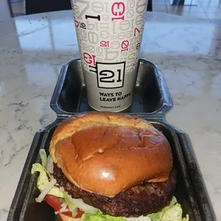 Impossible vegan plant based Impossible,patty, onions, lettuce, Roma tomato, toasted whole wheat bun. Sweet potato fries.