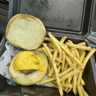a container of fries and a cheeseburger