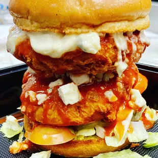 a stack of chicken burgers