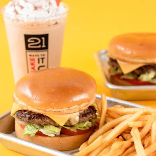 two burgers and french fries