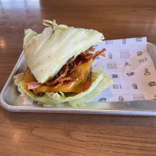 Barbecue bacon, burger correctly made.