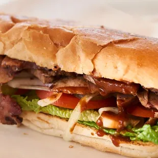 a bacon, lettuce, tomato, and lettuce sandwich