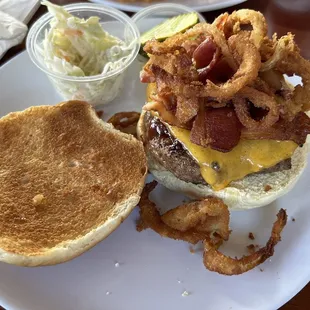 Smokehouse Burger - smoked bacon, crispy onion strings, house bbq sauce and cheddar $15. Delicious burger