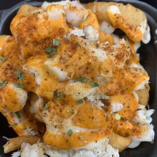 a plate of chicken and rice