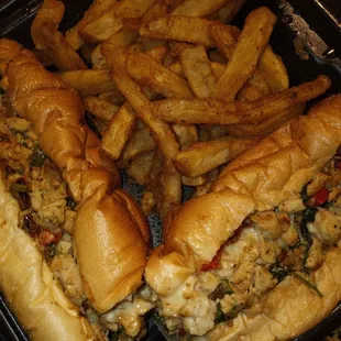 two subs and french fries