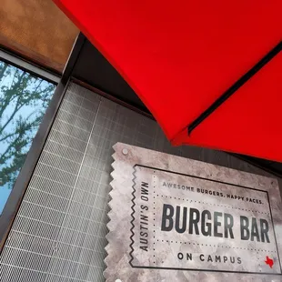red umbrellas and sign