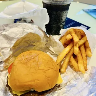 Cheeseburger with fries and Pepsi