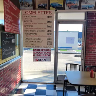 a menu on the wall of a restaurant