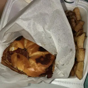 Breakfast croissant sandwich w bacon