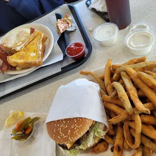 French toast ,eggs, and bacon. 1/4 burger w/ zucchini