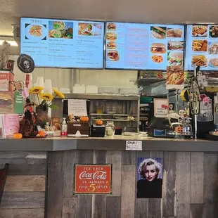 the counter and menus of a fast food restaurant