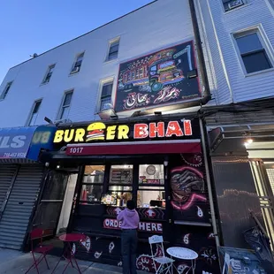 Exterior, no indoor dining. Just order at the window and eat outside with the tables provided or eat at home.