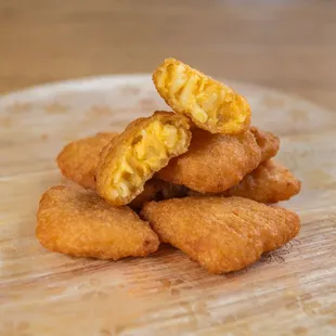 a pile of fried chicken nuggies