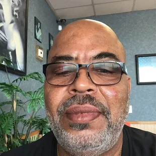 a man with glasses and a beard