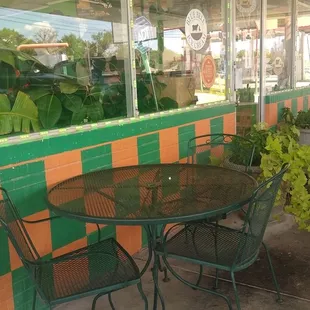 Humble patio with beautiful plants.