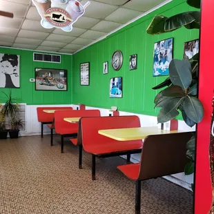 Seating, with Audrey Hepburn artwork.