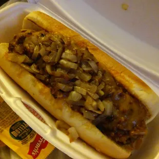 Tons of chili, cheese and grilled onions.