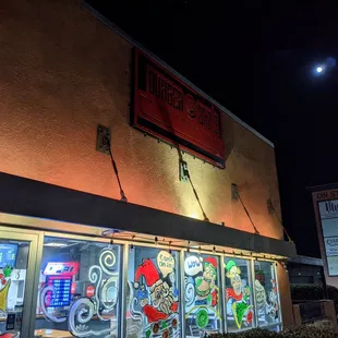 Exterior. The sign is a bit hard to read at night, it's the red rectangle at the top of the building