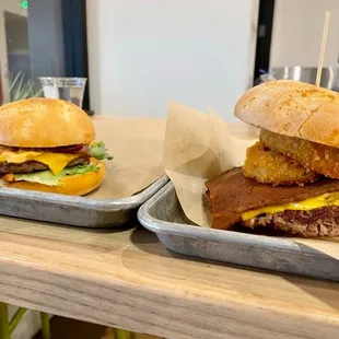 two trays of food on a table