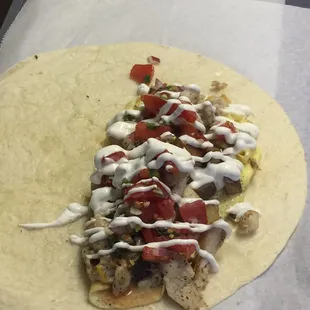 Come try a chicken breakfast burrito with homemade pico de gallo and lime crema!