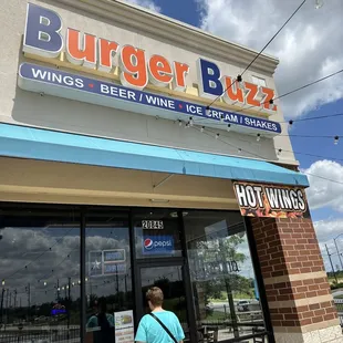 a woman entering a restaurant