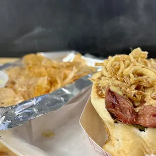 Don&apos;t sleep on the hot dogs!  Get it with kimchi &amp; onion strings.