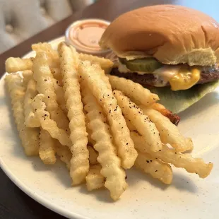 Single burger and crinkle fries.