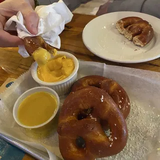 Three pretzel rolls