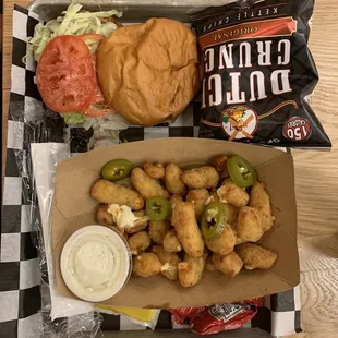 a tray of food and chips