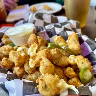Jalapeño cheese curds.  Excellent.  No heat to it however.