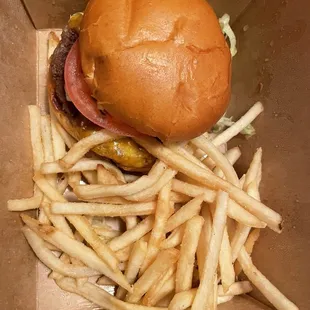 Their impossible burger. Fast food tasting plant-based burger and over salted gross fries.