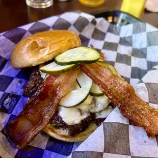 That's just a great burger.  Good saltiness. Tangy pickles.  Maybe could use a burger sauce.