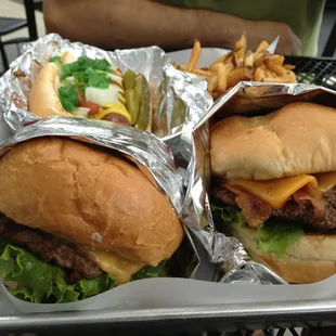 All American single burger, bacon cheddar burger, fries. The fries are awesome, crispy and flavorful!