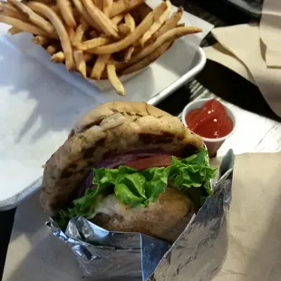 Salmon burger (yummy) with fries to die for!