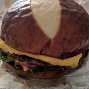 All American Burger with pretzel bun.