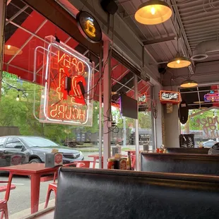 a neon sign in the window