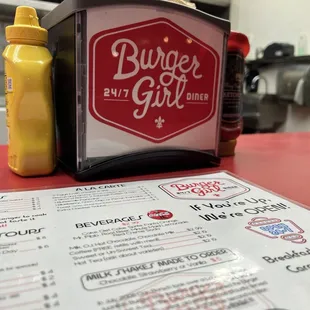 a burger and a bottle of mustard