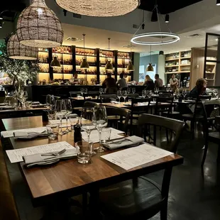 a dining room with tables and chairs