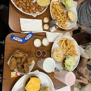 2. 1/2 lb. Burger Combo with fries and tater tots Garlic and hot wings