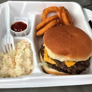 Cheeseburger basket with onion rings.