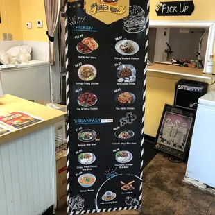 a menu board in a kitchen